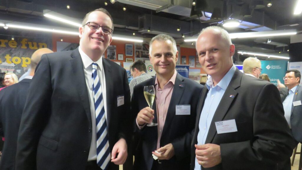 Guests seated together at a DCCQ community event in Brisbane